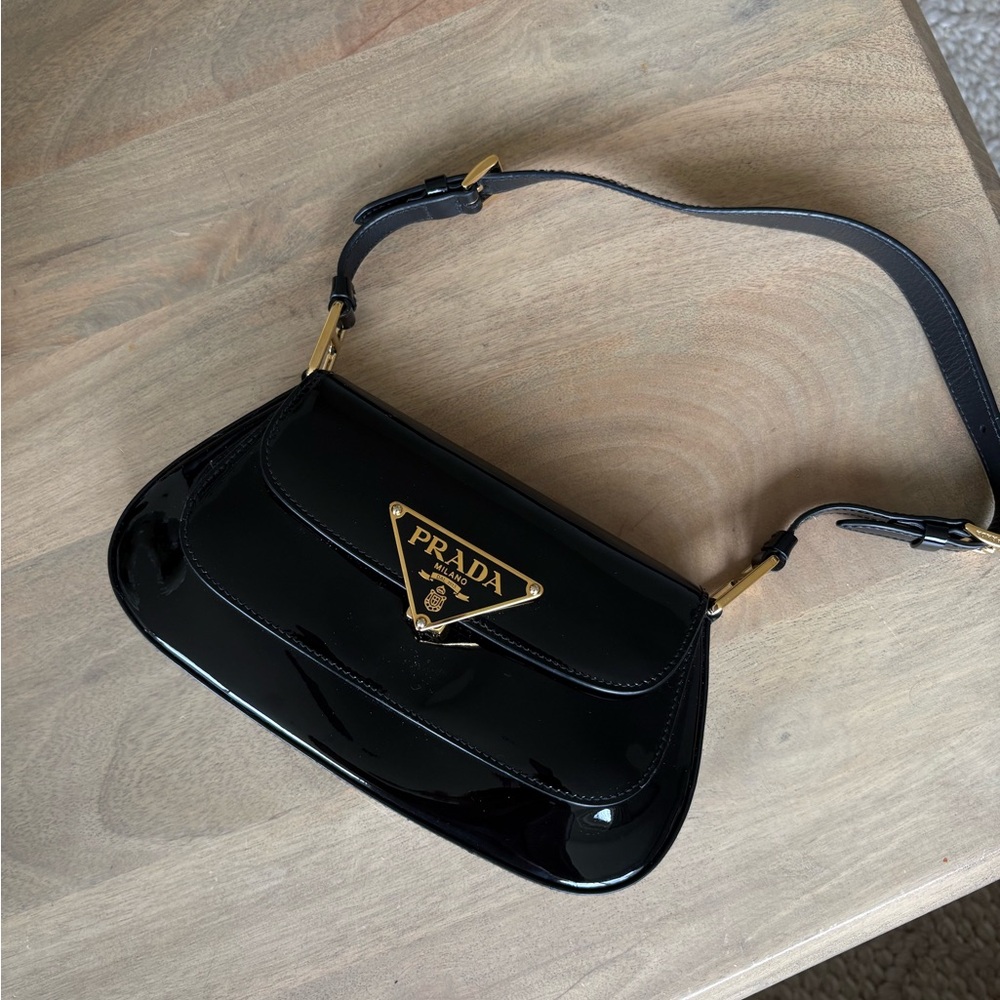 Prada Glossy Black Shoulder Bag with Gold Accents